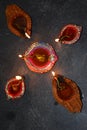 Disigning diyas with verious designed diya burning