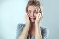 Disillusioned woman crying with big tears expressing sadness Royalty Free Stock Photo