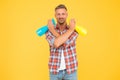 Disinfect and sanitize your household. Happy man hold spray bottles. Using household cleaners. Household hygiene Royalty Free Stock Photo