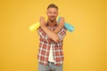 Disinfect and sanitize your household. Happy man hold spray bottles. Using household cleaners. Household hygiene Royalty Free Stock Photo