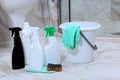 The disinfectant and bucket are on the floor in the toilet. Photo in the bathroom interior.Cleaning in an expensive hotel or house