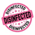 DISINFECTED text written on pink-black round stamp sign