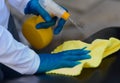 Disinfecting a surface to prevent spread of infections