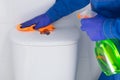 Disinfection of the toilet tank surfaces with a special cleaning agent