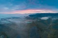 Disko Bay glacier during midnight sun season of polar summer. Ilulissat, Greenland. Unesco world heritage. Beautiful misty