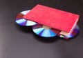 Disks in book Royalty Free Stock Photo