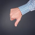 Dislike and disapprove hand gesture with thumb down Royalty Free Stock Photo