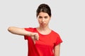 Dislike gesture bad job sad woman thumb down Royalty Free Stock Photo