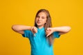 Dislike gesture disappointed kid wrong choice girl Royalty Free Stock Photo