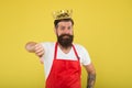 Dislike gesture. Royal recipe. Man king cook wear cooking apron and golden crown. Kitchen kingdom. Ideas and tips. Chief
