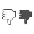 Dislike hand line and glyph icon. Thumb down vector illustration isolated on white. Unlike hand gesture outline style Royalty Free Stock Photo