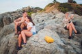 Disloyal man walking with his girlfriend and looking amazed at another seductive girl. Royalty Free Stock Photo