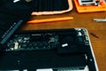 Dismantle laptop with tools and battery, display, hard disk and other components