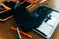 Dismantle laptop with tools and battery, display, hard disk and other components Royalty Free Stock Photo