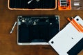 Dismantle laptop with tools and battery, display, hard disk and other components Royalty Free Stock Photo