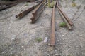 Dismantled railroad rails on ground outdoors Royalty Free Stock Photo