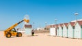 Dismantling beach huts at the end of the summer season