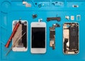 Dismantling the broken smartphone for repair