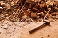 Dismantling, disassembling the floor. Smashed concrete and bricks floor. Destroying concrete surface. Renovation, old Royalty Free Stock Photo