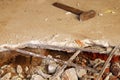 Dismantling, disassembling the floor. Smashed concrete and bricks floor. Destroying concrete surface. Renovation, old Royalty Free Stock Photo