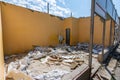 Dismantling of an illegally built store, the rest of the walls, construction waste