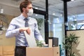 Dismissal employee in preventive medical mask in an epidemic coronavirus