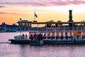 Disney Ferry boat and partial view of Grand Floridian Resort & Spa on sunset background at Walt Disney World  area 1 Royalty Free Stock Photo