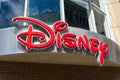 Disney logo, sign on the store facade
