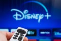 Disney plus on Apple TV showing on the screen of TV Royalty Free Stock Photo