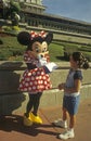 Disney World Magic Kingdom - Minnie Mouse and fan
