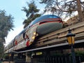 The Disneyland monorail is seen passing on the elevated track in Anaheim California.