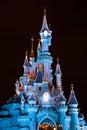 Disneyland Paris Castle during Christmas celebrations at night Royalty Free Stock Photo