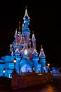 Disneyland Paris Castle at night with Christmas decorations Royalty Free Stock Photo