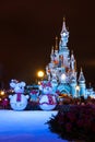 Disneyland Paris Castle at night with Christmas decorations Royalty Free Stock Photo