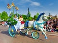 Disneyland Paris, France - April 2019: Enchanted Princess with Price in her chariot during a Disney Parade in Disneyland