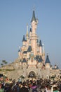 Disneyland Paris, France, November 2018: Tourist crowd Sleeping Beauty`s Castle