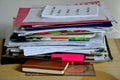 Disordered papers, clutter on a desk Royalty Free Stock Photo