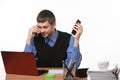 Dispatcher solves problems by talking on two phones Royalty Free Stock Photo