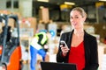 Dispatcher using phone at warehouse of forwarding