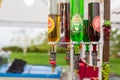 Dispenser with different sweet drinks additives. Food and cooking equipment at a street food festival