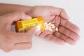 Dispensing Prescription Pills into Hand 1
