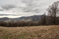 Dispersed settlement of Nydek village with hills of Slezske Beskydy arounds in borderland of Czech republic and Poland