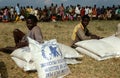 Displaced people waiting for aid distribution.