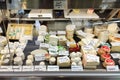 Display of artisanal cheese in small british store