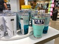 A display of bags of Yeti Tumblers at a Whole Foods Grocery Store