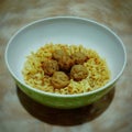 Boiled instant noodles with beef meatballs in a bowl Royalty Free Stock Photo
