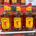 A display of bottles of Fireball Cinnamon Whisky with background bokeh at a Binneys liqour store in Springfield, Illinois