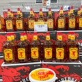A display of bottles of Fireball Cinnamon Whisky with background bokeh at a Binneys liqour store in Springfield, Illinois