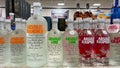 A display of bottles of flavored Absolut Vodka with background bokeh at a Binneys liqour store in Springfield, Illinois