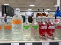 A display of bottles of flavored Absolut Vodka with background bokeh at a Binneys liqour store in Springfield, Illinois